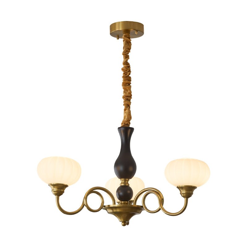 Elaris Curated Mouth-Blown Frosted Glass Chandel – illuminated warm ambiance setting #1