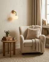 Elio Alabaster Curated Alabaster Wall Sconce – illuminated warm ambiance setting