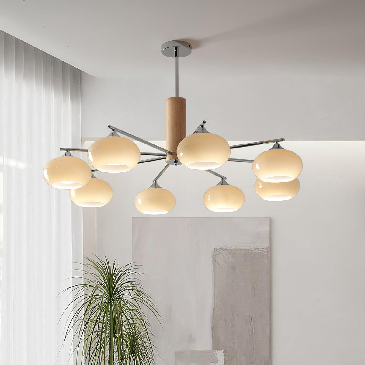Elliptical Persimmon Curated Mouth-Blown Frosted installed in residential dining space