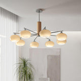 Elliptical Persimmon Curated Mouth-Blown Frosted installed in residential dining space