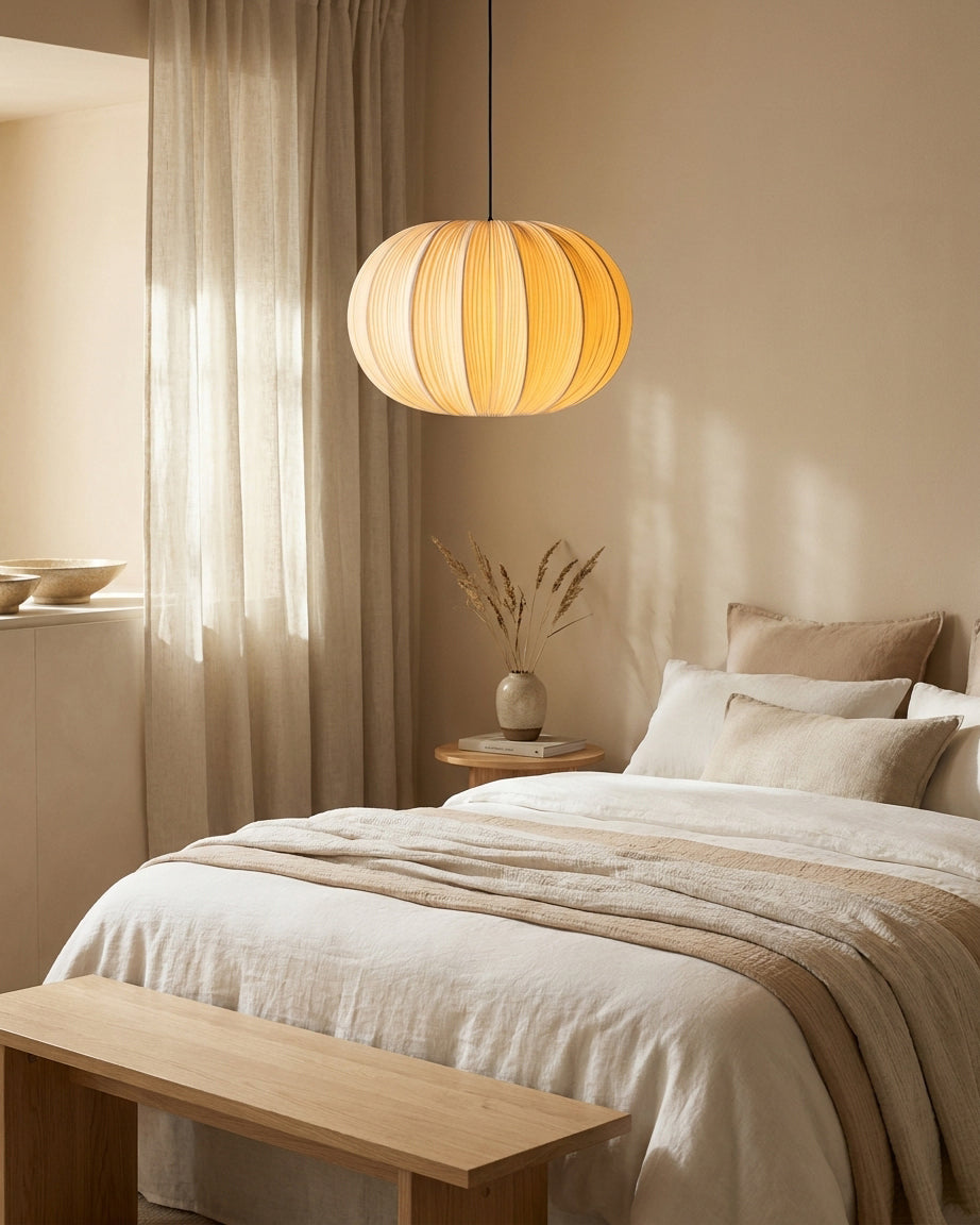 Elunor Curated Finished Iron Pendant Light – side angled contour profile
