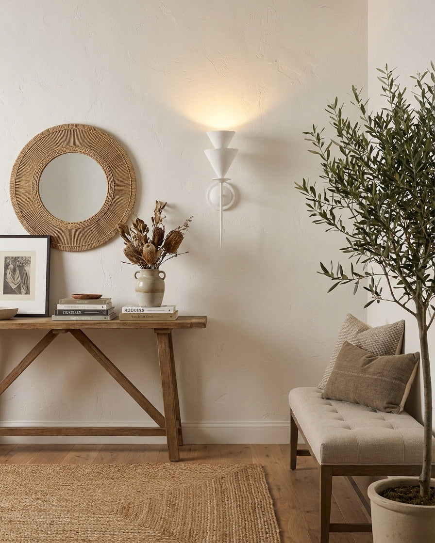 Fanoria Curated Iron & Glass Wall Sconce – illuminated warm ambiance setting