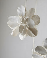 Florielle Cascade Curated Iron & Glass Chandelie – unlit natural material contrast