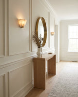 Fun Guy Alabaster Curated Alabaster Wall Sconce warm illuminated room view