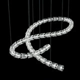 The Gabriel Knot LED Curated K9 Bohemian Crystal installed in residential dining space