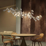 Gingko Curated Hand-Thrown Ceramic Chandelier – illuminated warm ambiance setting