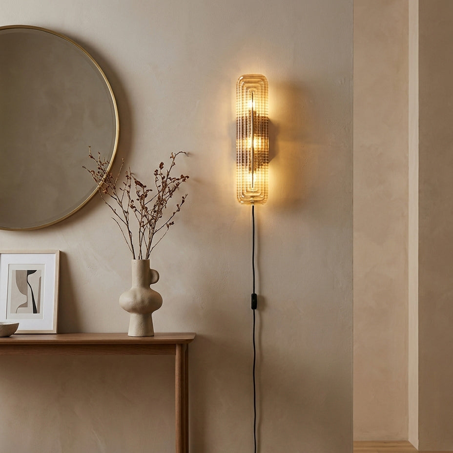 Glacium Plug-in Cast Glass Sconce warm illuminated room view