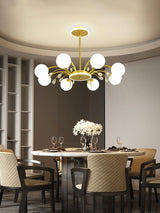 Glamorous Glass Raindrop Chandeliers Curated Mou warm illuminated room view