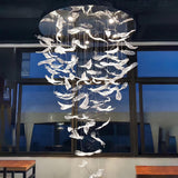Pluma Sculptural Feather Chandelier – spatial dining room perspective