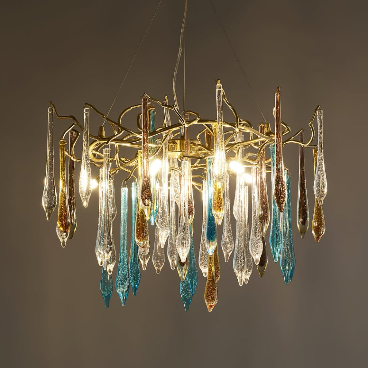 Gold Round Teardrop Curated Mouth-Blown Frosted – illuminated warm ambiance setting