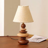 Grainelle Curated Iron & Glass Table Lamp – illuminated warm ambiance setting #1