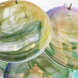 Green Glass Disc Chandelier – Ambient Illumination in Luxury Interior Setting View 8