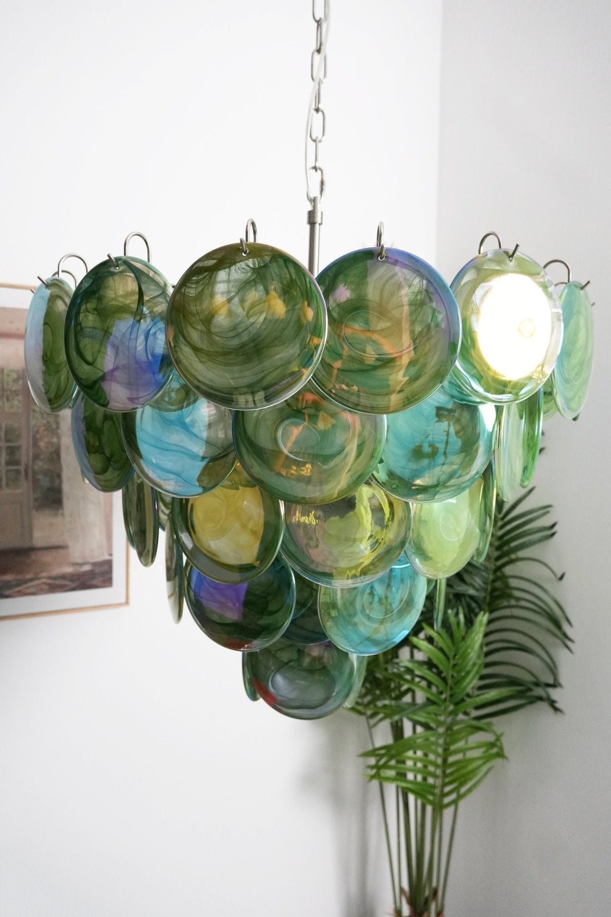 Green Glass Disc Chandelier – Ambient Illumination in Luxury Interior Setting View 3