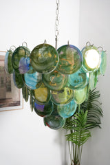 Green Glass Disc Chandelier – Ambient Illumination in Luxury Interior Setting View 3