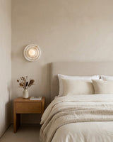 Grove Alabaster Curated Alabaster Wall Sconce warm illuminated room view
