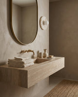 Grove Alabaster Curated Alabaster Wall Sconce – illuminated warm ambiance setting