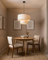 Hearthmere Curated Finished Iron Pendant Light warm illuminated room view