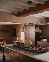 Heirloom Curated Solid Brass Chandelier – illuminated warm ambiance setting