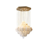 Hexa Alabaster Cascade Curated Alabaster Chandel – illuminated warm ambiance setting #1
