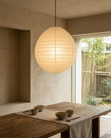 Hikari Paper Curated Washi Paper Pendant Light warm illuminated room view