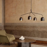 Howard Curated Solid Brass Chandelier installed in residential dining space