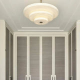 Ice Queen Alabaster Curated Alabaster Chandelier warm illuminated room view