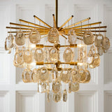 Jacqueline Curated Amber Art Glass Chandelier warm illuminated room view