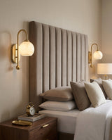 Juliet Alabaster Curated Alabaster Wall Sconce warm illuminated room view