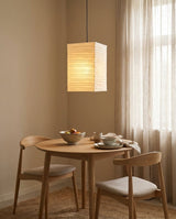 Kaku Paper Curated Washi Paper Pendant Light warm illuminated room view