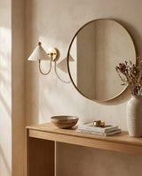 Kismet Alabaster Curated Alabaster Wall Sconce installed in residential dining space