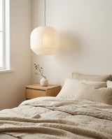 Kiyome Paper Curated Washi Paper Pendant Light installed in residential dining space