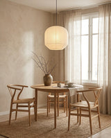 Kiyome Paper Curated Washi Paper Pendant Light warm illuminated room view