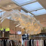 Koi Fish Inspired Curated Iron & Glass Chandelie – handcrafted surface texture
