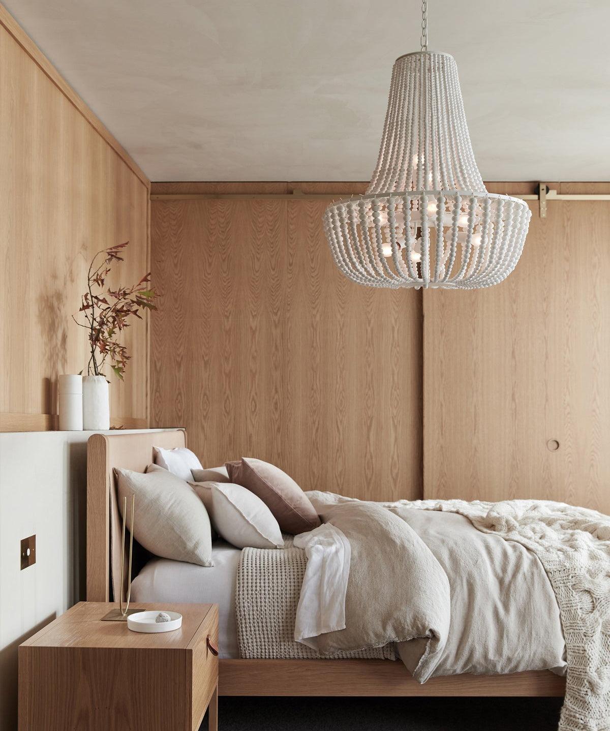 Koralky Curated Iron & Glass Chandelier – spatial dining room perspective