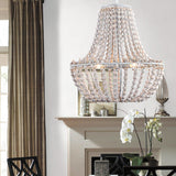 Koralky Curated Iron & Glass Chandelier – unlit natural material contrast