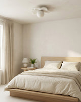 La Fleur Alabaster Curated Alabaster Flush Mount warm illuminated room view