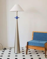 Lazuro Cone Floor Curated Iron & Glass Floor Lam warm illuminated room view