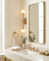 Leviano Brass Curated Mouth-Blown Frosted Glass – illuminated warm ambiance setting