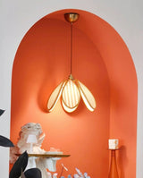 Lienne Curated Iron & Glass Pendant Light warm illuminated room view