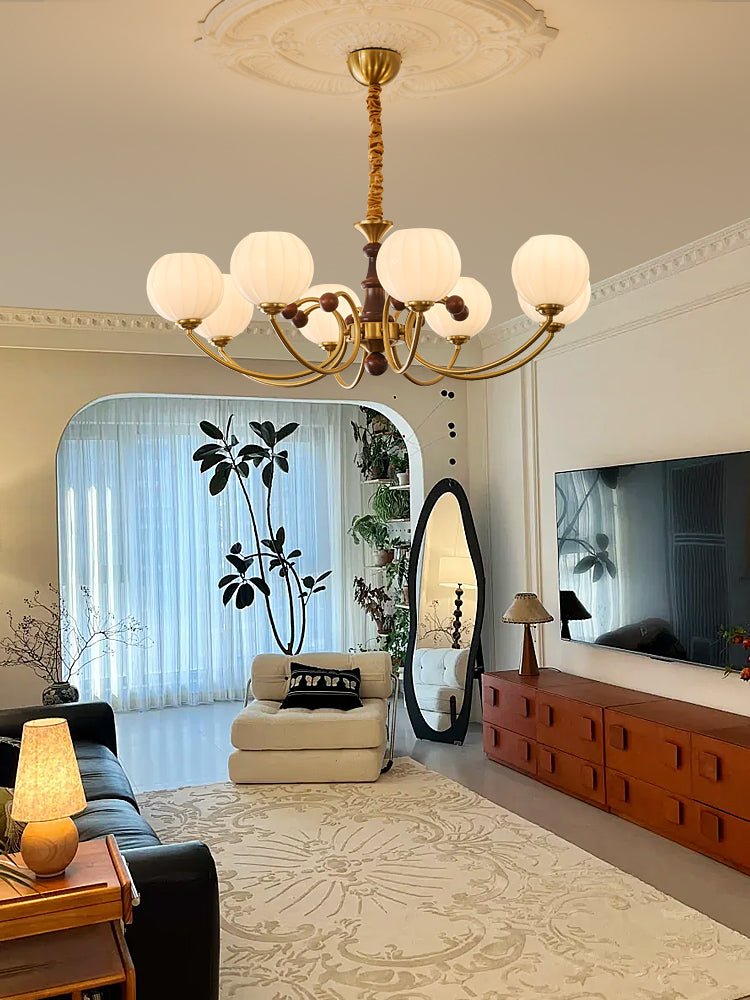 Livia Curated Mouth-Blown Frosted Glass Chandeli – spatial dining room perspective