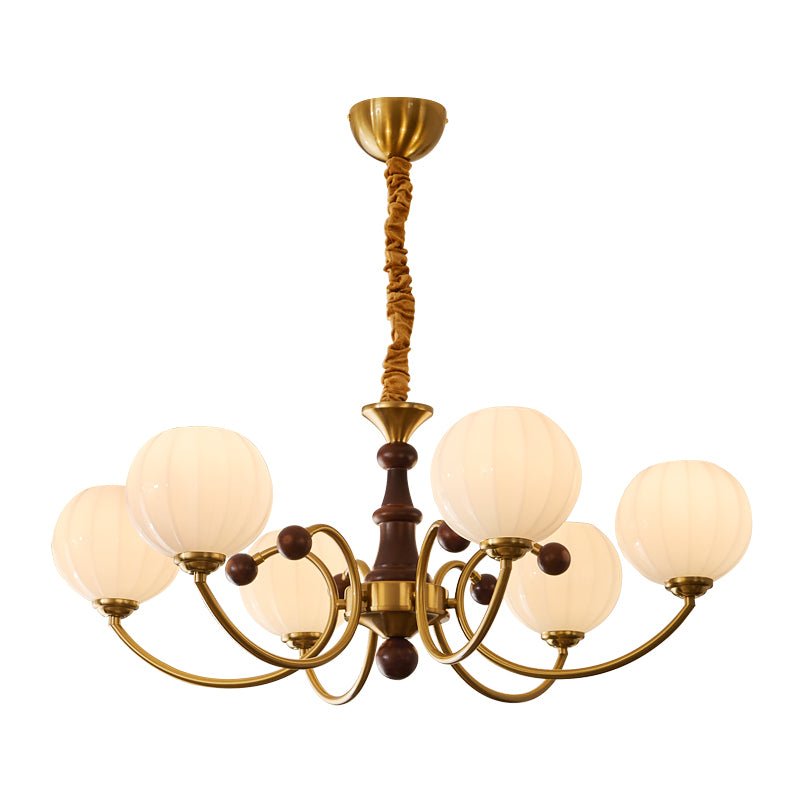 Livia Curated Mouth-Blown Frosted Glass Chandeli – illuminated warm ambiance setting #1