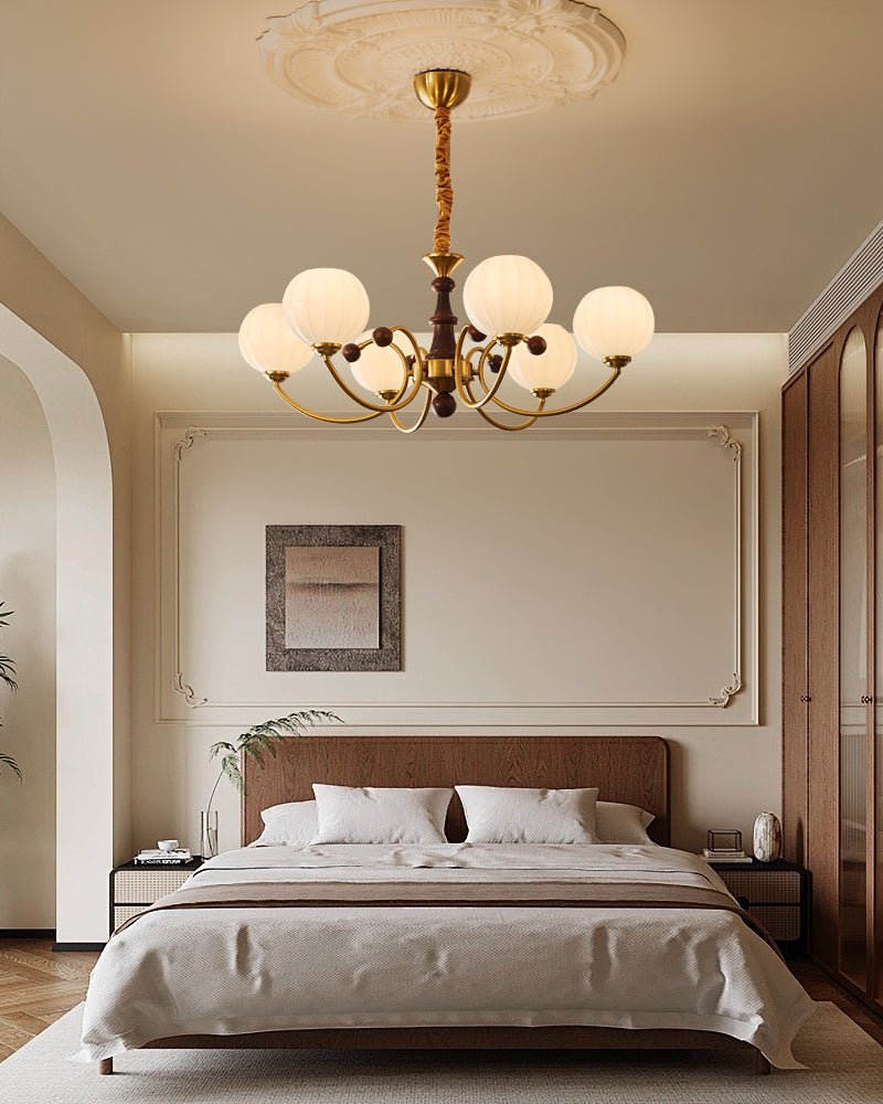 Livia Curated Mouth-Blown Frosted Glass Chandeli – illuminated warm ambiance setting
