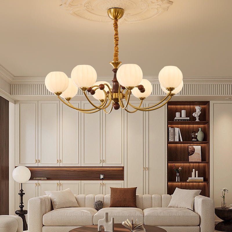Livia Curated Mouth-Blown Frosted Glass Chandeli installed in residential dining space