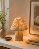 Green Stripe Mushroom Curated Iron & Glass Table – illuminated warm ambiance setting