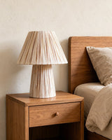 Green Stripe Mushroom Curated Iron & Glass Table warm illuminated room view