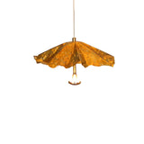 Golden Ginkgo Spiral Curated Solid Brass Chandel – illuminated warm ambiance setting #1