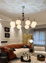 Lucienne Orb Chandelier – Ambient Illumination in Luxury Interior Setting View 12