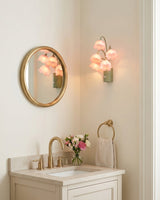 Lunelia Curated Iron & Glass Wall Sconce installed in residential dining space
