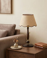 Madera Scallop Curated Solid Brass Table Lamp warm illuminated room view
