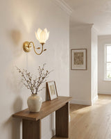 Magnelle Curated Solid Brass Wall Sconce installed in residential dining space